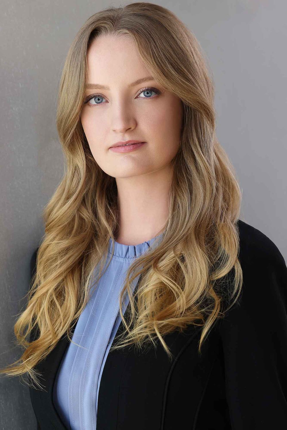 Chelsey Kaye headshot in a black blazer